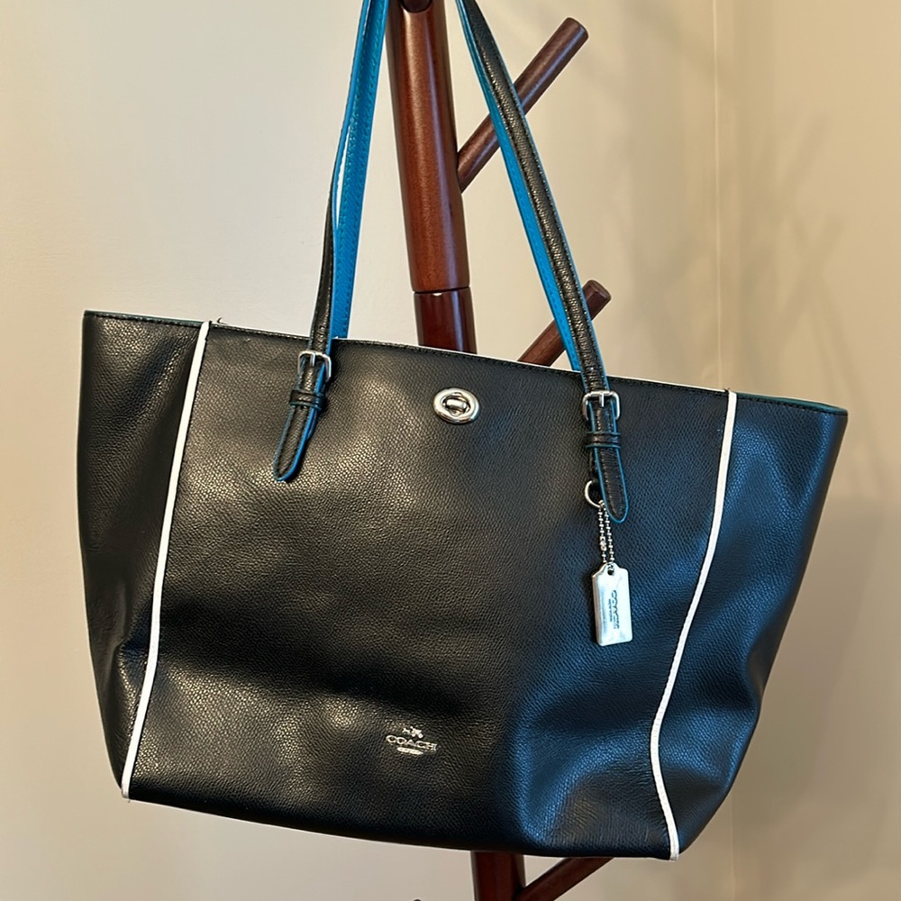 Black and teal Coach tote